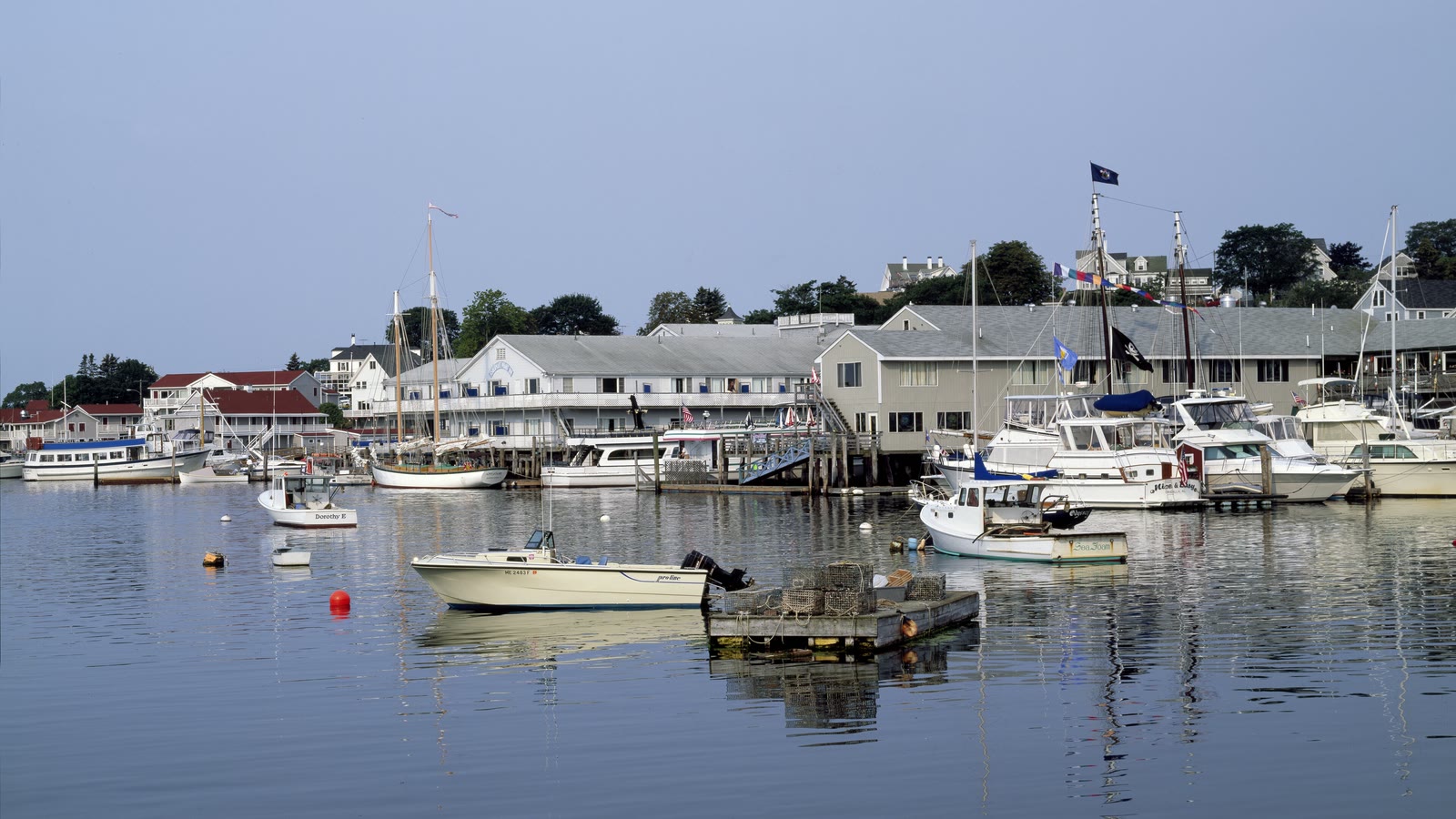 Boothbay Harbor waterfront with boats moored at the town landing